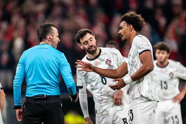 Denmark v Portugal, UEFA Nations League, Copenhagen, Denmark Copenhagen, Denmark. 20th, March 2025. Renato Veiga (13) of Portugal seen with referee Irfan Peljto during the UEFA Nations League play-off match between Denmark and Portugal at Parken in Copenhagen. Denmark, Copenhagen  Copyright: xGonzalesxPhoto FrederikkexJensenx