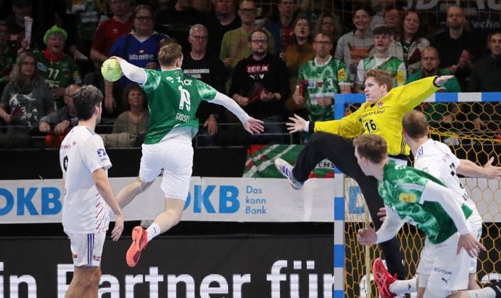Mathias Gidsel scores a goal against goalkeeper Robin Paulsen Haug duel Game scene Action Sport Handball HBL Bundesliga Men 24 Matchday Season 2024 2025 30 03 2025 Füchse Berlin vs HSV Hamburg