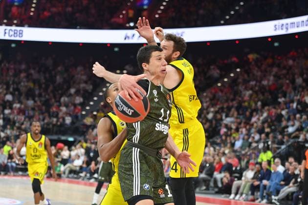 VLADIMIR LUCIC FCB , action,duel against Nicolo MELLI Fenerbahce , Basketball Euro League,season 2024 2025 FC Bayern Muenchen Fenerbahce Istanbul on 10 04 2025, S A P G A R D EN