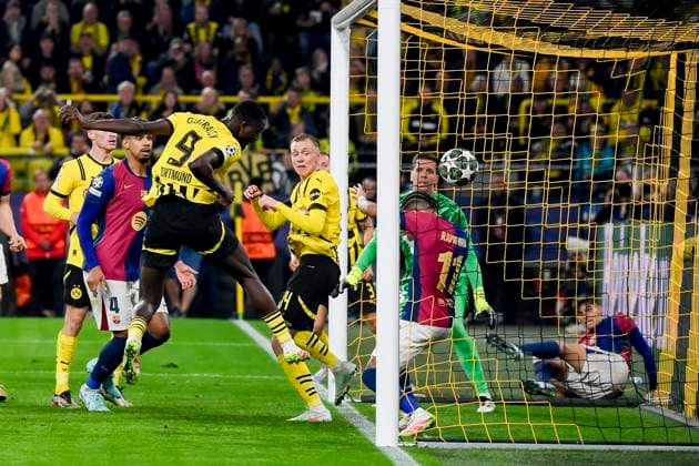 Serhou Guirassy Borussia Dortmund scores his team s second goal during the UEFA Champions League 2024 25 Quarter Final Second Leg match between Borussia Dortmund and FC Barcelona at BVB Stadion Dortmund on April 15, 2025 in Dortmund, Germany Photo by Max Maiwald DeFodi Images