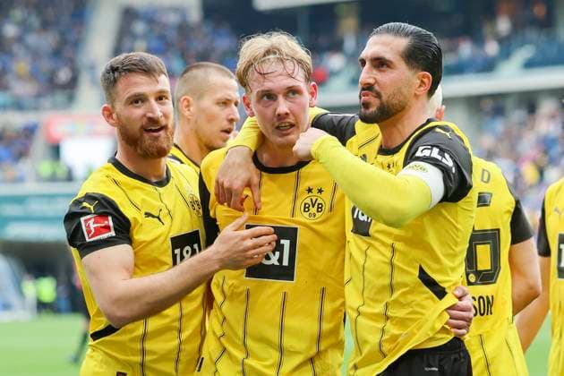Julian Brandt Borussia Dortmund celebrates scoring his teams second goal with Salih Oezcan Borussia Dortmund and Emre Can Borussia Dortmund , Bundesliga, TSG 1899 Hoffenheim v Borussia Dortmund, PreZero Arena, April 26, 2025 in Sinsheim, Germany Photo by Marco Steinbrenner DeFodi Images Julian Brandt Borussia Dortmund celebrates after scoring his teams second goal with Salih Oezcan Borussia Dortmund and Emre Can Borussia Dortmund , Bundesliga, TSG 1899 Hoffenheim v Borussia Dortmund, PreZero Arena, April 26, 2025 in Sinsheim, Germany Photo by Marco Steinbrenner DeFodi Images DFL regulations prohibit any use of photographs as image sequences and or quasi video