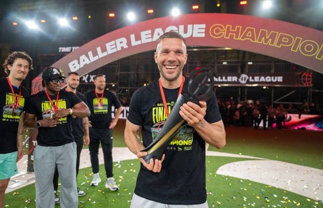 Soccer, Men, Spring 2025, Indoor, 3 Season of the Baller League in Berlin, Final Four, Final, Streets United Gönrgy Allstars 7 1 , Award Ceremony Streets United, Manager Lukas Podolski with Cup 19 05 2025, Copyright: xMatthiasxKochx