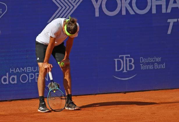 Bitpanda Hamburg Open, ATP Tournament 500, Round of 16 Alexander Zverev Germany leans exhausted on his thighs after an intense rally
