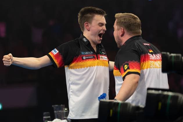 World Cup of Darts 2025 Ricardo Pietreczko Germany and Martin Schindler Germany cheer after winning the PDC World Cup second round match between England and Germany on June 14, 2025 at the Eissporthalle in Frankfurt am Main , Frankfurt am Main Hessen Germany Eissporthalle