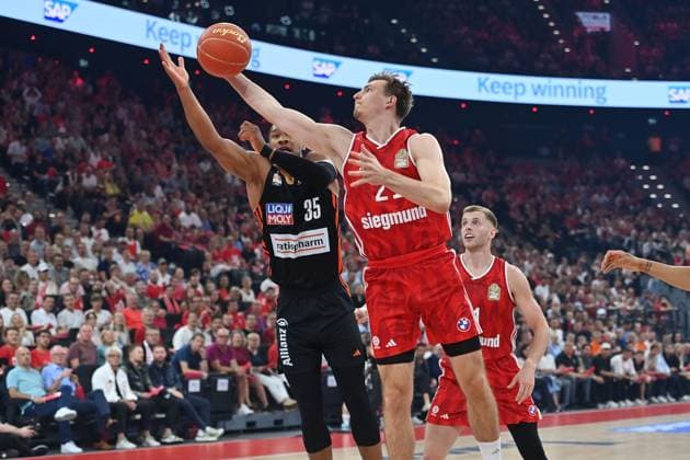 Justus HOLLATZ FCB , action,duel against Karim JALLOW UL Basketball BBL,season 2024 2025 5 final, FC Bayern Muenchen Ratiopharm Ulm on 26 06 2025, S A P G A R D EN