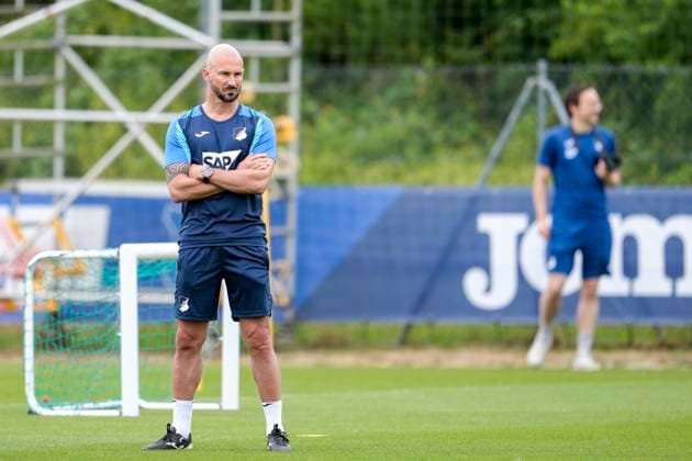 Christian Ilzer coach, head coach, Hoffenheim , cropped image, full body, single image, single photo, action, action, 06 07 2025, Zuzenhausen Germany , football, Bundesliga, training kick-off TSG 1899 Hoffenheim, DFB DFL REGULATIONS PROHIBIT ANY USE OF PHOTOGRAPHS AS IMAGE SEQUENCES AND OR QUASI VIDEO xozx