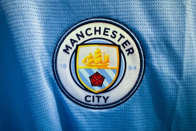 Football Clubs Logos Manchester City logo is seen on a football jersey in this illustration photo taken in a store in Krakow, Poland on July 24, 2025 Krakow Poland  Copyright: xJakubxPorzyckix originalFilename:0827136004st.jpg