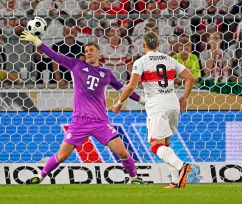 16 08 2025, Bundesliga 2025 2026, Franz Beckenbauer Supercup, VfB Stuttgart FC Bayern Munich, in the MHP Arena Stuttgart Goalkeeper Manuel Neuer FC Bayern Munich parries the ball f l Goalkeeper Manuel Neuer FC Bayern Munich and Ermedin Demirovic Stuttgart