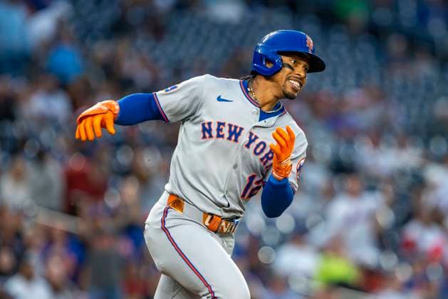 New York Mets shortstop Francisco Linder (12) doubles on a fly ball to right field in the top of the third inning during a game against the Washington Nationals at Nationals Park in Washington, DC on Tuesday, August 19, 2025.  WAP20250819302 BONNIExCASH
