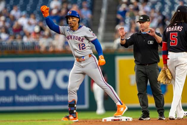 New York Mets shortstop Francisco Linder (12) celebrates a double on a fly ball to right field in the top of the third inning during a game against the Washington Nationals at Nationals Park in Washington, DC on Tuesday, August 19, 2025.  WAP20250819303 BONNIExCASH