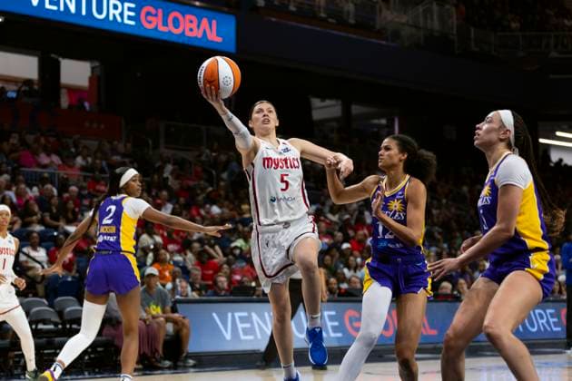 July 22, 2025, Washington, District Of Columbia, USA: JADE MELBOURNE 5 of the Washington Mystics drives to the basket against RAE BURRELL 12 of the Los Angeles Sparks at CareFirst Arena Washington USA - ZUMAs352 20250722_zsp_s352_041 Copyright: xSabinaxShyshx
