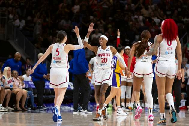 July 22, 2025, Washington, District Of Columbia, USA: JADA MELBOURNE 5 and BRITTNEY SYKES 20 of the Washington Mystics high five during the game against the Los Angeles Sparks at CareFirst Arena Washington USA - ZUMAs352 20250722_zsp_s352_047 Copyright: xSabinaxShyshx