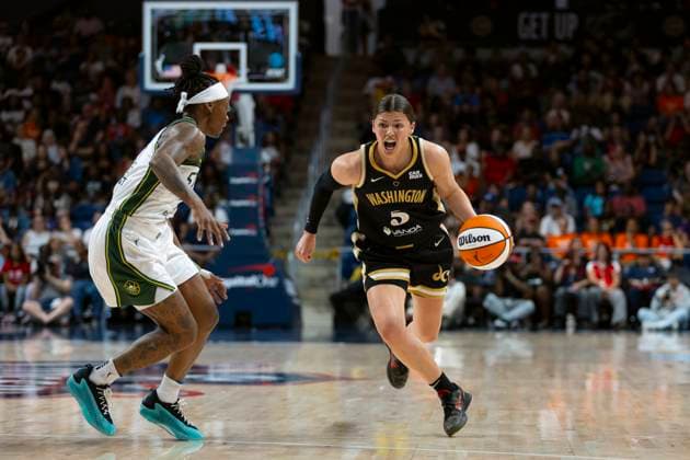 July 26, 2025, Washington, District Of Columbia, USA: JADE MELBOURNE 5 of the Washington Mystics handles the ball against ERICA WHEELER 17 of the Seattle Storm at CareFirst Arena Washington USA - ZUMAs352 20250726_zsp_s352_041 Copyright: xSabinaxShyshx