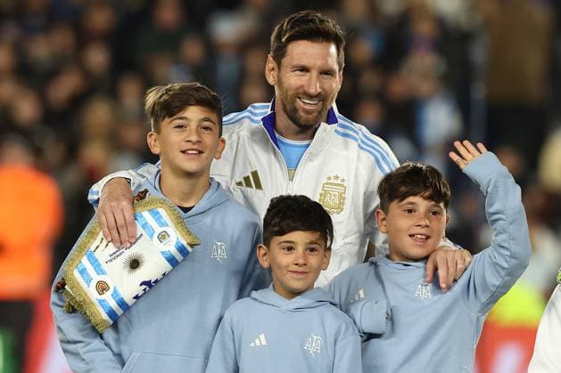 Argentina s forward Lionel Messi C back and his three children Thiago, Mateo and Ciro gesture before the South American qualification football match between Argentina and Venezuela for the FIFA World Cup 2026 at the Monumental stadium in Buenos Aires on September 4, 2025 BUENOS AIRES ARGENTINA Copyright: xALEJANDROxPAGNIx