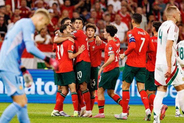 Players of Portugal seen celebrating after goal from Bernardo Silva during World Cup 2026 European qualification game between national teams of Hungary and Portugal (Maciej Rogowski Ball Raw Images) Budapest Puskas Arena Hungary Copyright: xMaciejxRogowskix maciejrogowski_hungary_portugal_2526-16