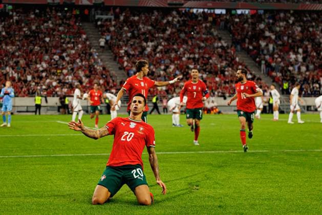 Joao Cancelo seen celebrating after scoring goal during World Cup 2026 European qualification game between national teams of Hungary and Poland (Maciej Rogowski Ball Raw Images) Budapest Puskas Arena Hungary Copyright: xMaciejxRogowskix maciejrogowski_hungaryvsportugal_2526-586