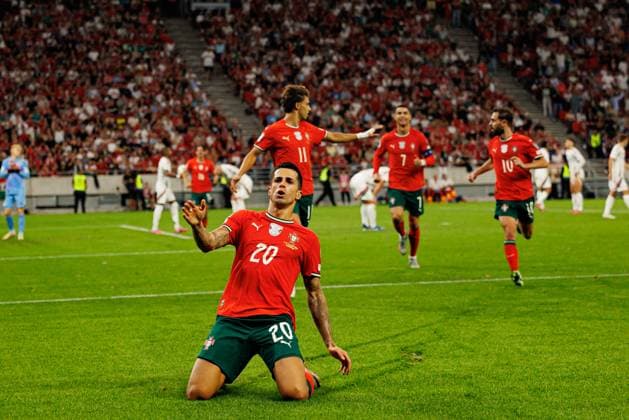 Joao Cancelo seen celebrating after scoring goal during World Cup 2026 European qualification game between national teams of Hungary and Poland (Maciej Rogowski Ball Raw Images) Budapest Puskas Arena Hungary Copyright: xMaciejxRogowskix maciejrogowski_hungaryvsportugal_2526-587