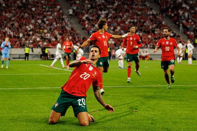 Joao Cancelo seen celebrating after scoring goal during World Cup 2026 European qualification game between national teams of Hungary and Poland (Maciej Rogowski Ball Raw Images) Budapest Puskas Arena Hungary Copyright: xMaciejxRogowskix maciejrogowski_hungaryvsportugal_2526-589