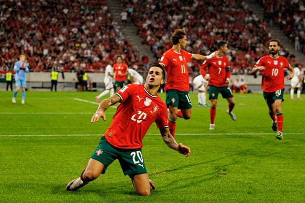 Joao Cancelo seen celebrating after scoring goal during World Cup 2026 European qualification game between national teams of Hungary and Poland (Maciej Rogowski Ball Raw Images) Budapest Puskas Arena Hungary Copyright: xMaciejxRogowskix maciejrogowski_hungaryvsportugal_2526-590