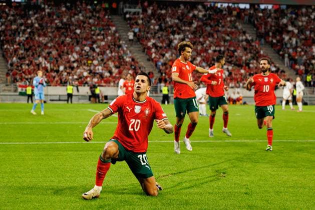 Joao Cancelo seen celebrating after scoring goal during World Cup 2026 European qualification game between national teams of Hungary and Poland (Maciej Rogowski Ball Raw Images) Budapest Puskas Arena Hungary Copyright: xMaciejxRogowskix maciejrogowski_hungaryvsportugal_2526-591