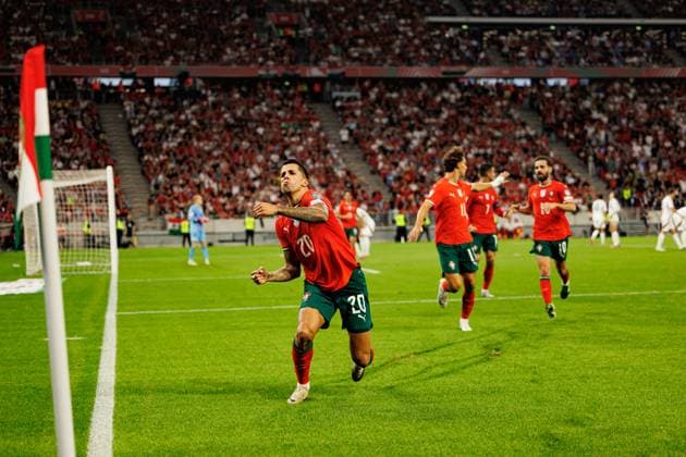 Joao Cancelo seen celebrating after scoring goal during World Cup 2026 European qualification game between national teams of Hungary and Poland (Maciej Rogowski Ball Raw Images) Budapest Puskas Arena Hungary Copyright: xMaciejxRogowskix maciejrogowski_hungaryvsportugal_2526-592