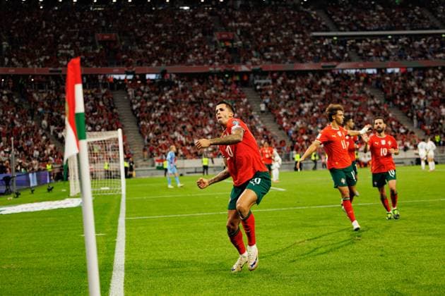 Joao Cancelo seen celebrating after scoring goal during World Cup 2026 European qualification game between national teams of Hungary and Poland (Maciej Rogowski Ball Raw Images) Budapest Puskas Arena Hungary Copyright: xMaciejxRogowskix maciejrogowski_hungaryvsportugal_2526-593