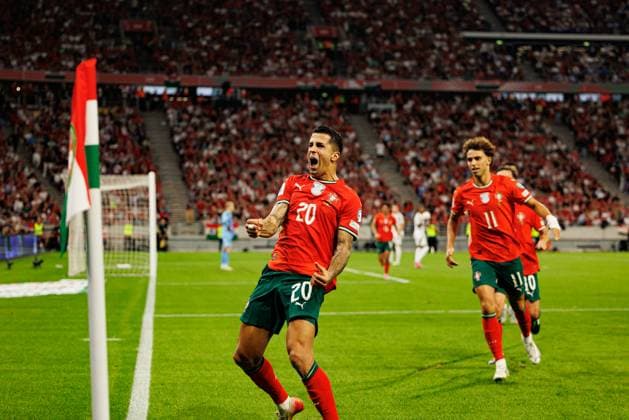 Joao Cancelo seen celebrating after scoring goal during World Cup 2026 European qualification game between national teams of Hungary and Poland (Maciej Rogowski Ball Raw Images) Budapest Puskas Arena Hungary Copyright: xMaciejxRogowskix maciejrogowski_hungaryvsportugal_2526-594