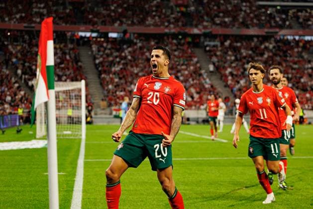 Joao Cancelo seen celebrating after scoring goal during World Cup 2026 European qualification game between national teams of Hungary and Poland (Maciej Rogowski Ball Raw Images) Budapest Puskas Arena Hungary Copyright: xMaciejxRogowskix maciejrogowski_hungaryvsportugal_2526-597