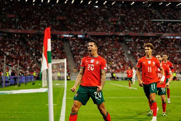 Joao Cancelo seen celebrating after scoring goal during World Cup 2026 European qualification game between national teams of Hungary and Poland (Maciej Rogowski Ball Raw Images) Budapest Puskas Arena Hungary Copyright: xMaciejxRogowskix maciejrogowski_hungaryvsportugal_2526-598