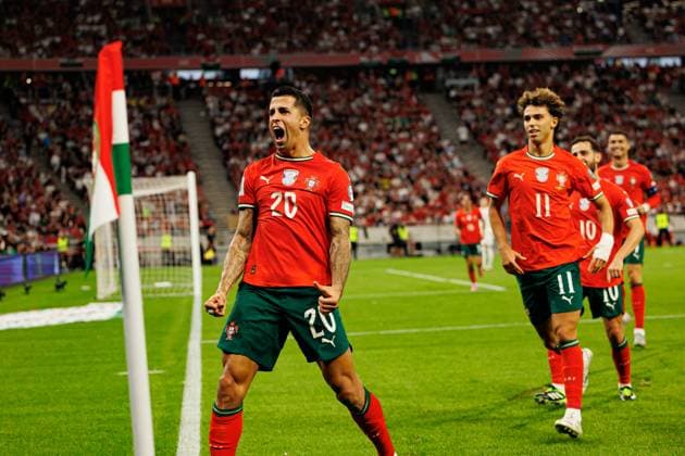 Joao Cancelo seen celebrating after scoring goal during World Cup 2026 European qualification game between national teams of Hungary and Poland (Maciej Rogowski Ball Raw Images) Budapest Puskas Arena Hungary Copyright: xMaciejxRogowskix maciejrogowski_hungaryvsportugal_2526-599