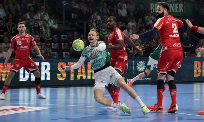 Mathias Gidsel scores a goal against goalkeeper Laszlo Bartucz duel Game scene Action Sport Handball HBL Bundesliga Men 5 Matchday Season 2025 2026 21 09 2025 Füchse Berlin vs MT Melsungen