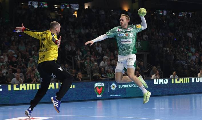 Mathias Gidsel scores a goal against goalkeeper Laszlo Bartucz duel Game scene Action Sport Handball HBL Bundesliga Men 5 Matchday Season 2025 2026 21 09 2025 Füchse Berlin vs MT Melsungen