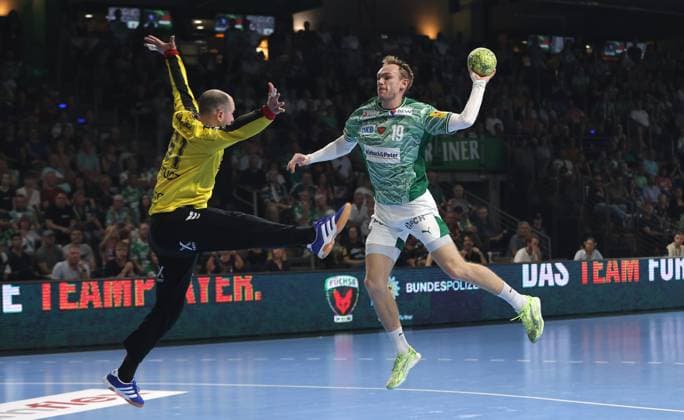 Mathias Gidsel scores a goal against goalkeeper Laszlo Bartucz duel Game scene Action Sport Handball HBL Bundesliga Men 5 Matchday Season 2025 2026 21 09 2025 Füchse Berlin vs MT Melsungen