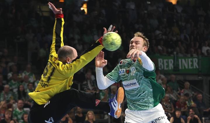 Mathias Gidsel scores a goal against goalkeeper Laszlo Bartucz duel Game scene Action Sport Handball HBL Bundesliga Men 5 Matchday Season 2025 2026 21 09 2025 Füchse Berlin vs MT Melsungen