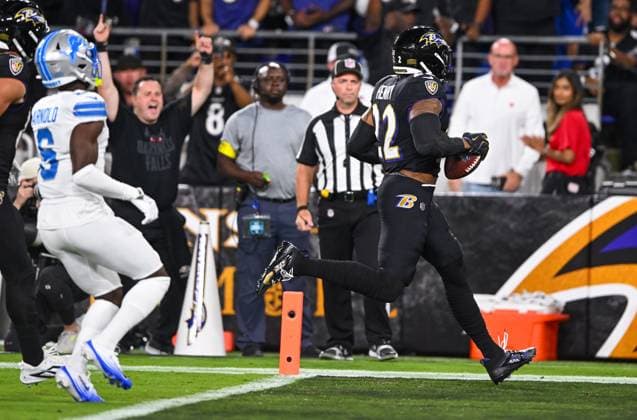 Baltimore Ravens running back Derrick Henry (22) beats Detroit Lions cornerback Terrion Arnold (6) into the end zone for a 28-yard touchdown during the first quarter at M&T Bank Stadium in Baltimore, Maryland, on Monday, September 22, 2025. BAL20250922115 DAVIDxTULIS