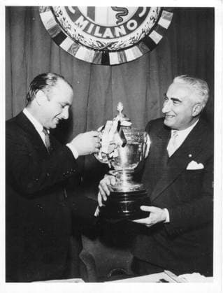 Car world champion 1951 Juan Fangio will honored Director from Alfa Romeo Engineer Alessio Â¸presented Fangio the groï¬en Silver Cup 08 11 1951