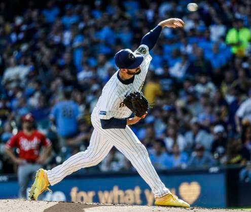 Milwaukee Brewers relief pitcher Aaron Ashby throws in the fifth inning of the MBL game between the Cincinnati Reds and the Milwaukee Brewers at American Family Field in Milwaukee, Wisconsin on Sunday, September 28, 2025.  MIL20250928823 TANNENxMAURY