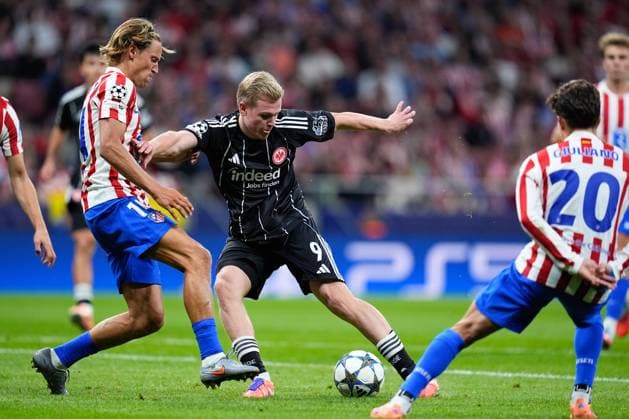 September 30, 2025, Madrid, Madrid, Spain: Jonathan Burkardt of Eintracht Frankfurt and Marcos Llorente of Atletico de Madrid compete for the ball during the UEFA Champions League 2025 26 League Phase MD2 match between Atletico de Madrid and Eintracht Frankfurt at Riyadh Air Metropolitano on September 30, 2025, in Madrid, Spain. Madrid Spain - ZUMAa181 20250930_zaa_a181_319 Copyright: xDennisxAgyemanx
