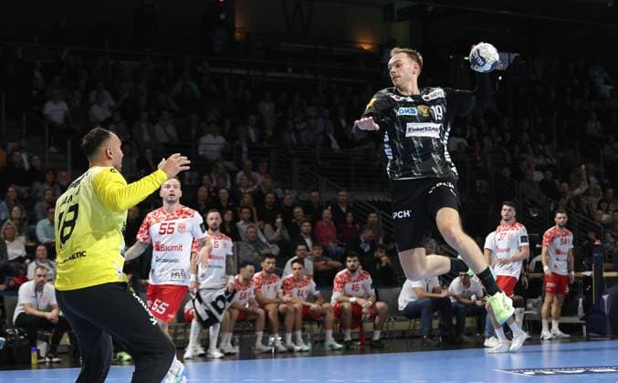 Mathias Gidsel scores a goal against goalkeeper Ionut Iancu duel Match scene Action Sport Handball CL Champions League Champions League Men 4 Matchday Season 2025 2026 09 10 2025 Füchse Berlin vs Dinamo Bucharest in the Max Schmeling Halle
