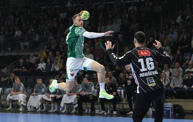 Mathias Gidsel scores a goal against goalkeeper Tibor Ivanisevic duel Game scene Action Sport Handball HBL Bundesliga Men 8 Matchday Season 2025 2026 12 10 2025 Füchse Berlin vs TSV GWD Minden