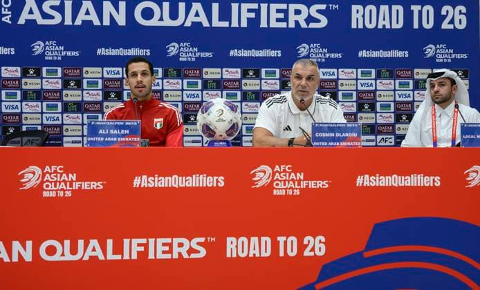 press conference, PK, Pressekonferenz TEAM UNITED ARAB EMIRATES-2026 FIFA World Cup, WM, Weltmeisterschaft, Fussball ASIAN QUALIFIER PLAYOFFS Head coach of United Arab Emirates Cosmin Olaroiu (C) and player Ali Saleh (L) attend a press conference ahead of the FIFA World Cup 2026 AFC Asian qualifiers playoffs group A match between Qatar and United Arab Emirates at Jassim Bin Hamad Stadium in Doha, Qatar, on October 14, 2025. DOHA Qatar Copyright: xNOUSHADx