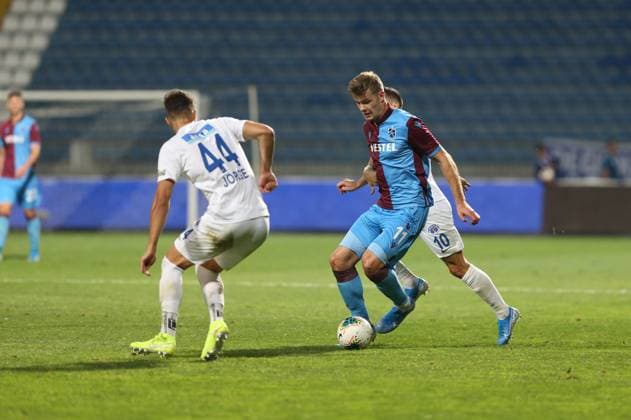 Kasimpasa v Trabzonspor: Turkish Super Lig ISTANBUL, TURKEY - AUGUST 18: Jorge Fernandes (44) of Kasimpasa and Alexander Sorloth (11) of Trabzonspor vie for the ball during Turkish Super Lig soccer match between Kasimpasa and Trabzonspor at Recep Tayyip Erdogan Stadium in Istanbul, Turkey on August 18, 2019. Istanbul Turkey. Editorial use only. Please get in touch for any other usage.  Copyright: x2025xAnadoluxÄ°slamxYakutx