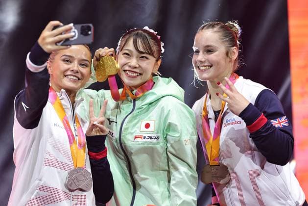 Winners Ruby Evans GBR, Aiko Sugihara JPN, Abigail Martin GBR after floor final at 2025 Worlds in Jakarta 25 10 2025
