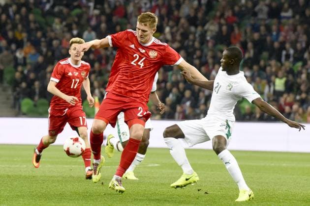 International Friendly, Länderspiel, Nationalmannschaft Russia - Cote d Ivoire KRASNODAR, RUSSIA - MARCH 24: Alexander Bukharov (L) of Russia in action against player of Cote d Ivoire s during the friendly football match at Krasnodar Stadium, in Krasnodar, Russia, on March 24,2017. Krasnodar Rusya. Editorial use only. Please get in touch for any other usage. Copyright: x2025xAnadoluxElenaxSineokx