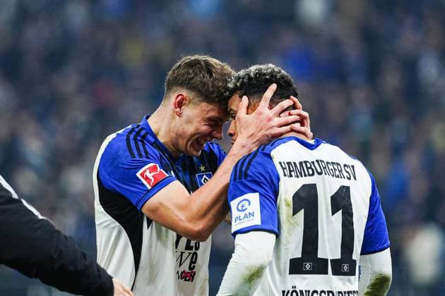 Goal celebration Nicolai Remberg Hamburger SV, 21 and Ransford Yeboah Koenigsdoerffer Hamburger SV, 11 after goal to 1 1 Ransford Yeboah Koenigsdoerffer Hamburger SV, 11 GER, Hamburger SV vs Borussia Dortmund, Football, 1 Bundesliga, Matchday 10, Season 2025 2026, 08 11 2025 DFL REGULATIONS PROHIBIT ANY USE OF PHOTOGRAPHS AS IMAGE SEQUENCES AND OR QUASI VIDEO GER, Hamburger SV vs Borussia Dortmund, Football, 1 Bundesliga, Matchday 10, Season 2025 2026, 08 11 2025 Hamburg Copyright: xEibner-Pressefoto MarcelxvonxFehrnx EP_MFN