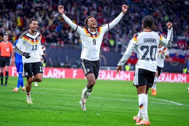 17 11 2025, Football, International match, World Cup Qualification Europe, Germany Slovakia, Red Bull Arena Leipzig , Matchday 10, Season 2025 2026 Goal celebration after the goal to 6 0 by scorer Forzan Assan Ouedraogo GER 09 together with Felix Nmecha GER 13 Serge Gnabry GER 20 Regulations prohibit any use of photographs as image sequences and or quasi video Sachsen Deutschland