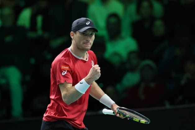 Belgian Raphael Collignon reacts during a tennis match against Italian Berrettini, the first in the Davis Cup semifinals between Belgium and Italy, in Bologna, Italy, on Friday 21 November 2025. The Davis Cup top eight Finals take place in Bologna from November 18 to 23. BENOITxDOPPAGNE  x143253577x