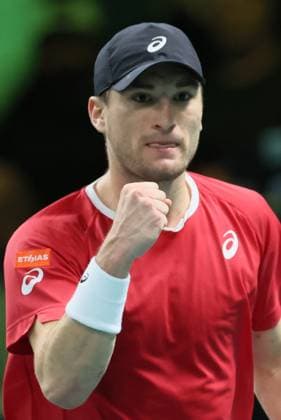 Belgian Raphael Collignon reacts during a tennis match against Italian Berrettini, the first in the Davis Cup semifinals between Belgium and Italy, in Bologna, Italy, on Friday 21 November 2025. The Davis Cup top eight Finals take place in Bologna from November 18 to 23. BENOITxDOPPAGNE  x143253981x