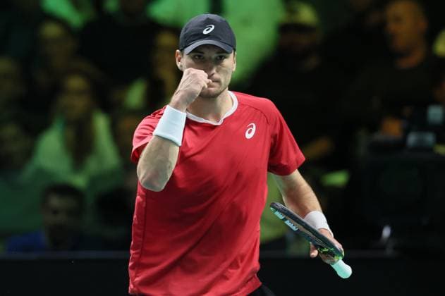 Belgian Raphael Collignon reacts during a tennis match against Italian Berrettini, the first in the Davis Cup semifinals between Belgium and Italy, in Bologna, Italy, on Friday 21 November 2025. The Davis Cup top eight Finals take place in Bologna from November 18 to 23. BENOITxDOPPAGNE  x143254150x