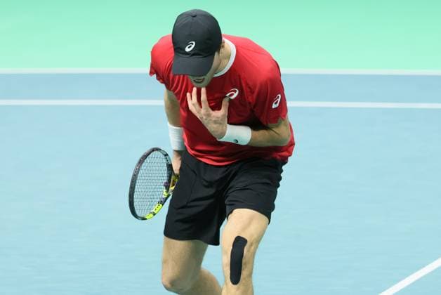 Belgian Raphael Collignon reacts during a tennis match against Italian Berrettini, the first in the Davis Cup semifinals between Belgium and Italy, in Bologna, Italy, on Friday 21 November 2025. The Davis Cup top eight Finals take place in Bologna from November 18 to 23. BENOITxDOPPAGNE  x143255482x